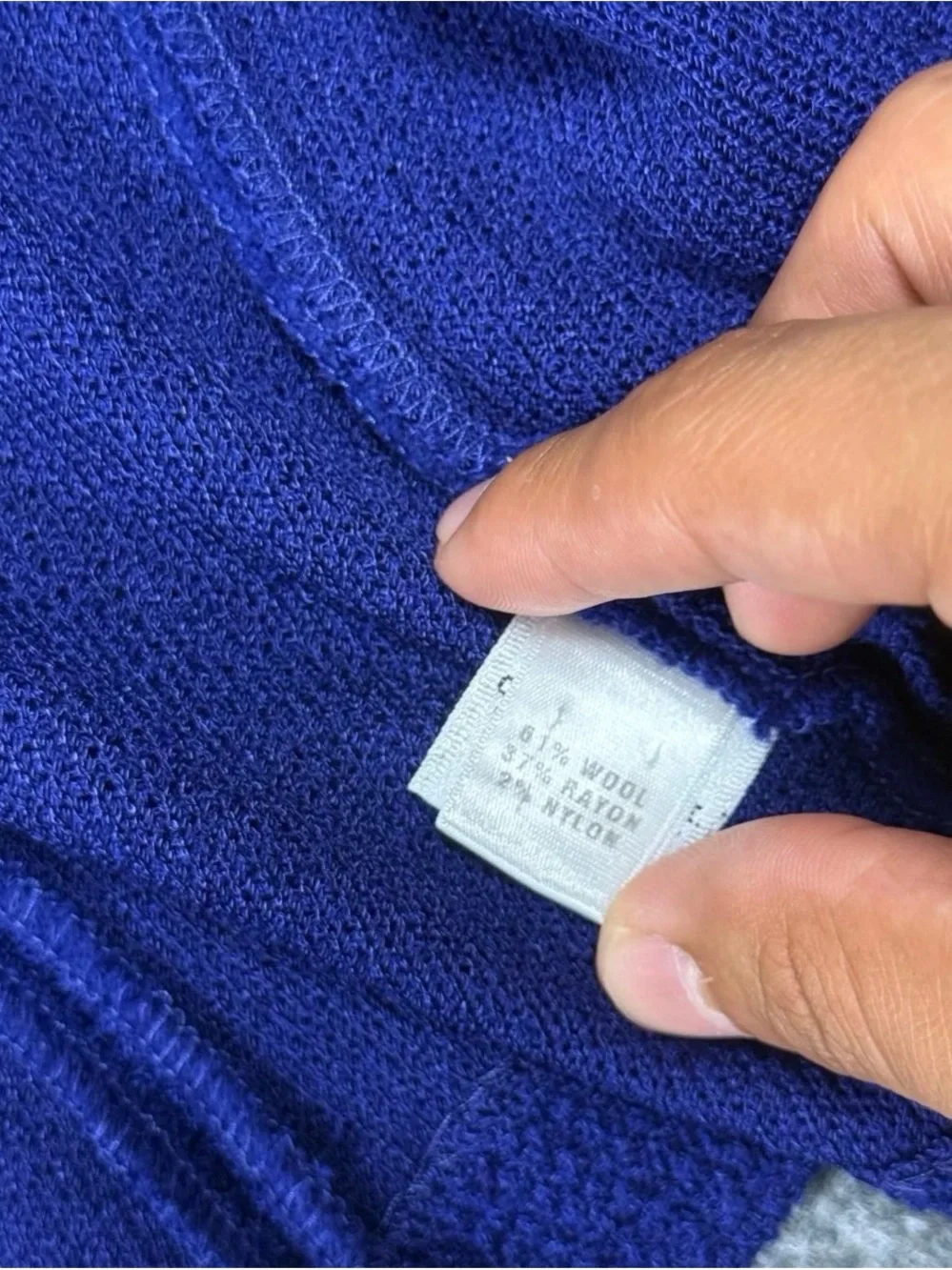 St. John Collection Blue knit skirt suit features a jacket Size 12